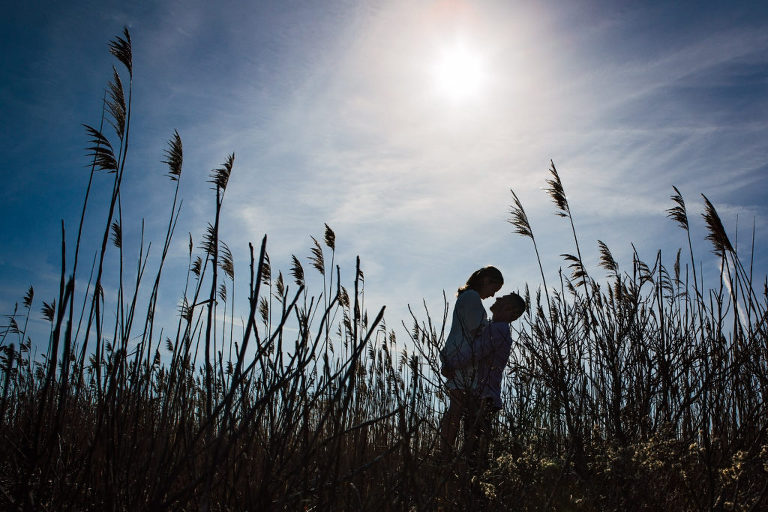 Couple poses for artistic image during Ocean City winter engagement session