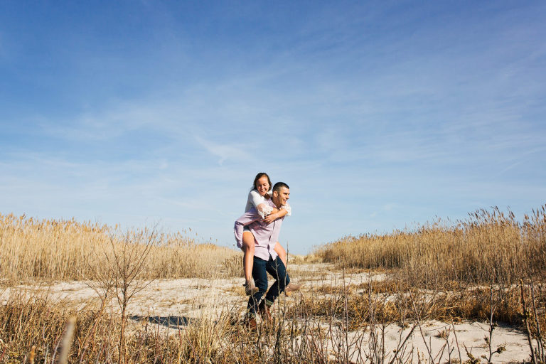Couple has fun during Ocean City engagement session with Kaleidoscope Imagery