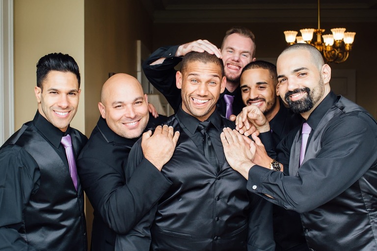 Groom and groomsmen pose for a fun shot at Cairnwood Estate