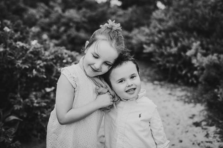 black and white photo of brother and sister on Belmar Beach