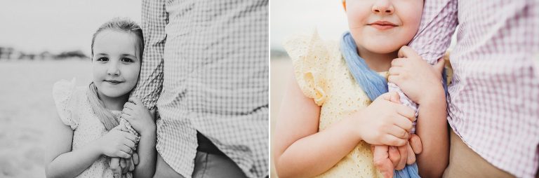 A girl holds her Dad's hand at Belmar family session