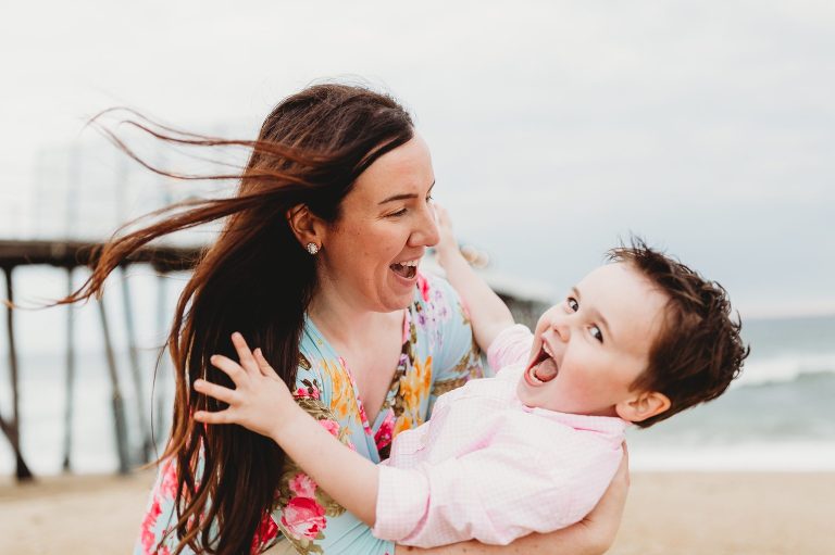 A mom and her son share a candid moment in Belmar, NJ